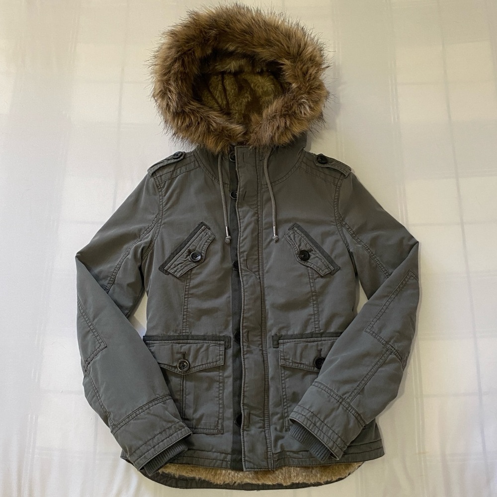 Fur-lined jacket with fur hood